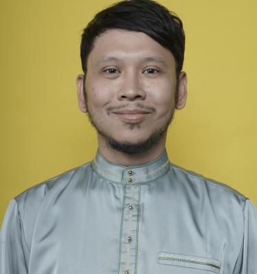 Johan Faladhin, M.I.Kom